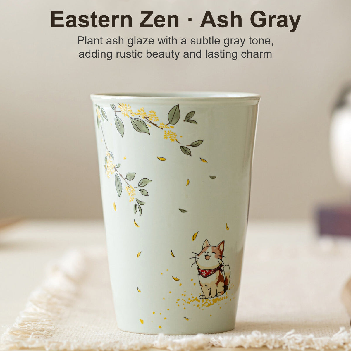 Handcrafted plant ash glaze ceramic mug with hand-painted cat and osmanthus design, gallery view 1