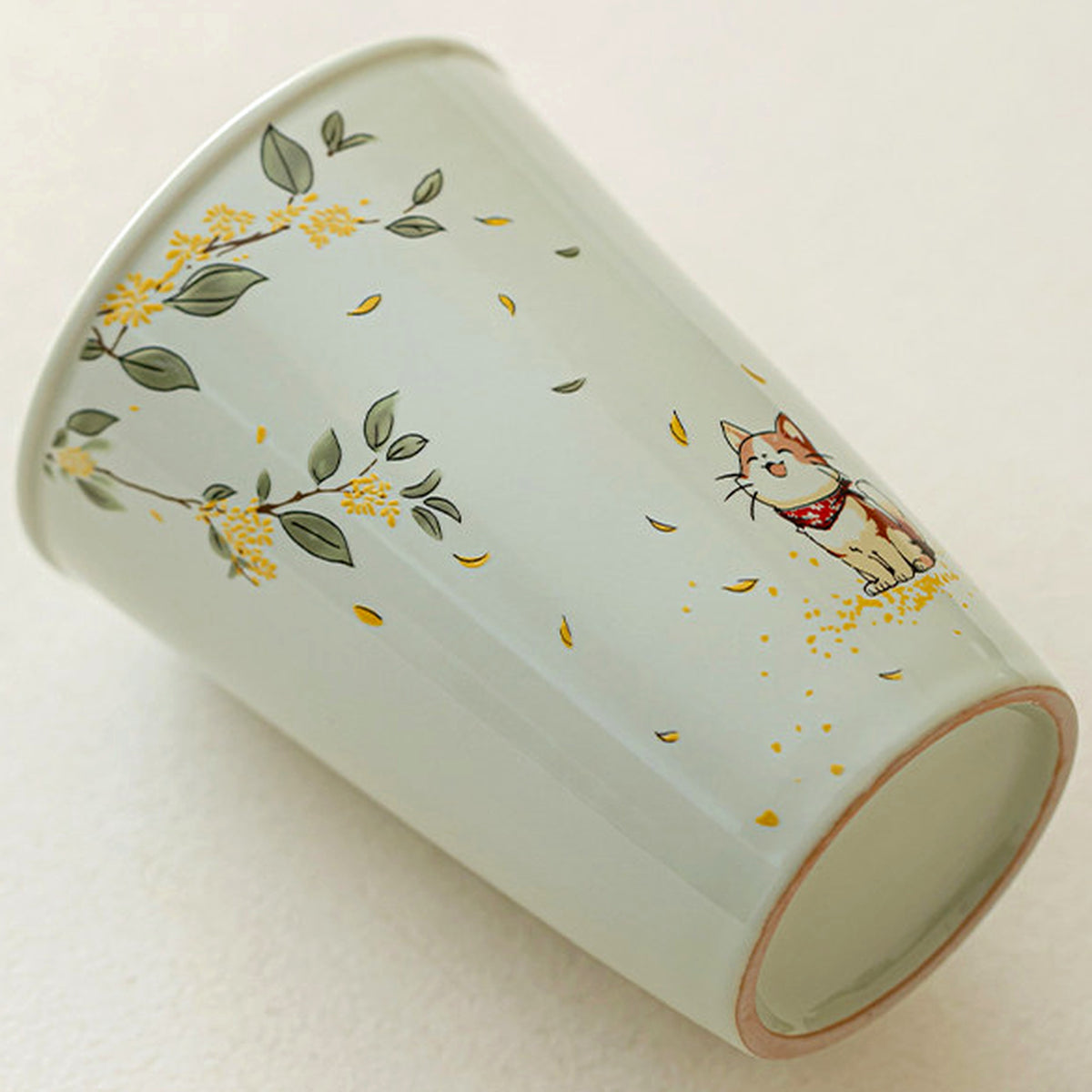 Handcrafted plant ash glaze ceramic mug with hand-painted cat and osmanthus design, gallery view 3