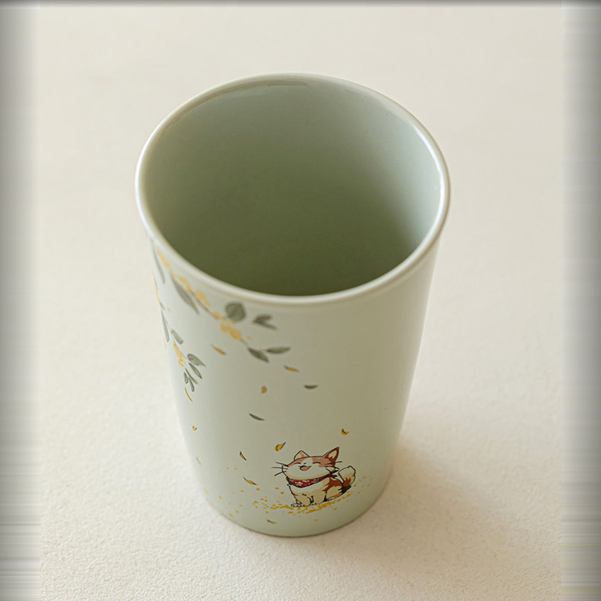 Handcrafted plant ash glaze ceramic mug with hand-painted cat and osmanthus design, gallery view 7