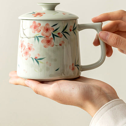 Hand-painted peach blossom ceramic mug with ceramic lid and tea strainer, gallery view 6