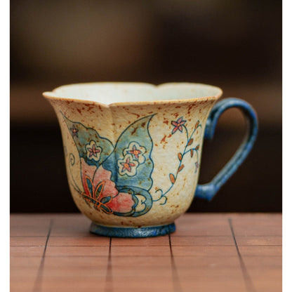 Hand-painted gold-traced butterfly tea cup with heart-shaped handle, gallery view 2