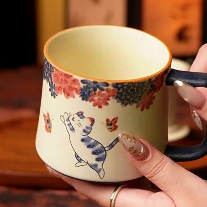 Mineral white tea infuser mug with hand-decorated butterfly and cat art, gallery view 4