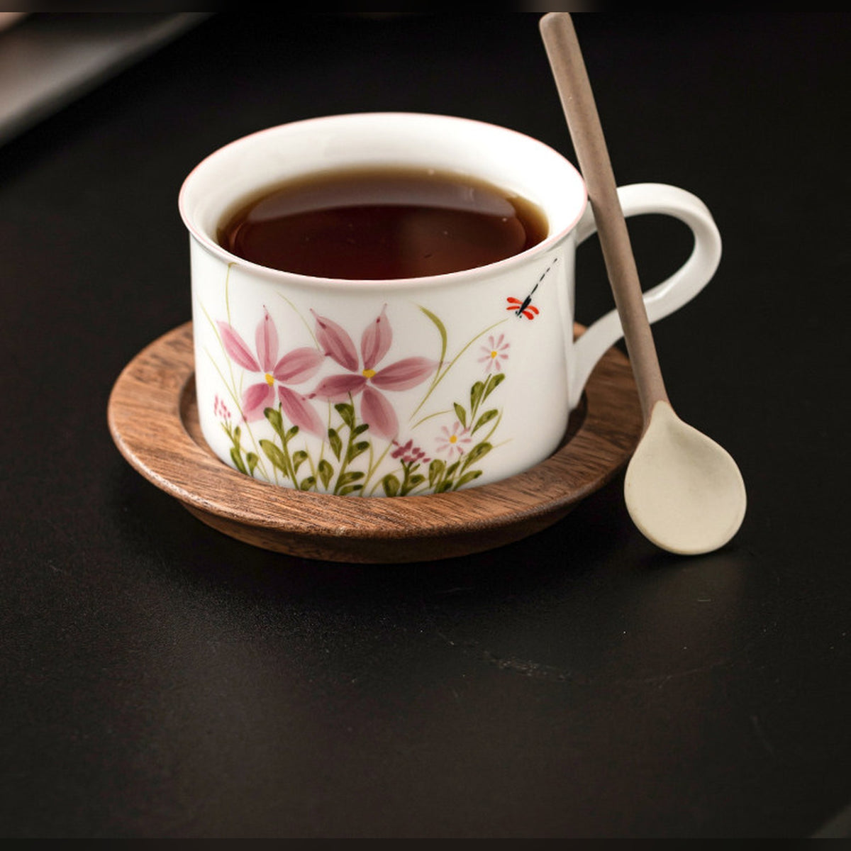 Hand-painted daisy dragonfly ceramic coffee cup with walnut saucer and cat spoon