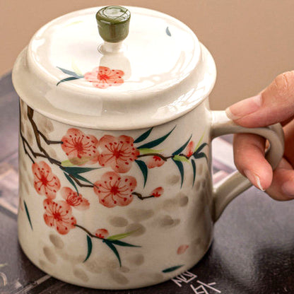 Plant-ash gray ceramic tea mug with hand-painted peach blossoms and lid